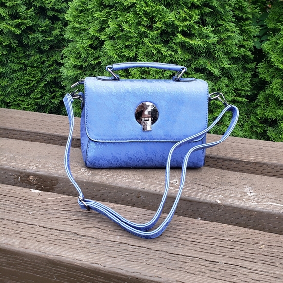 Handbags - Blue purse with lace look print